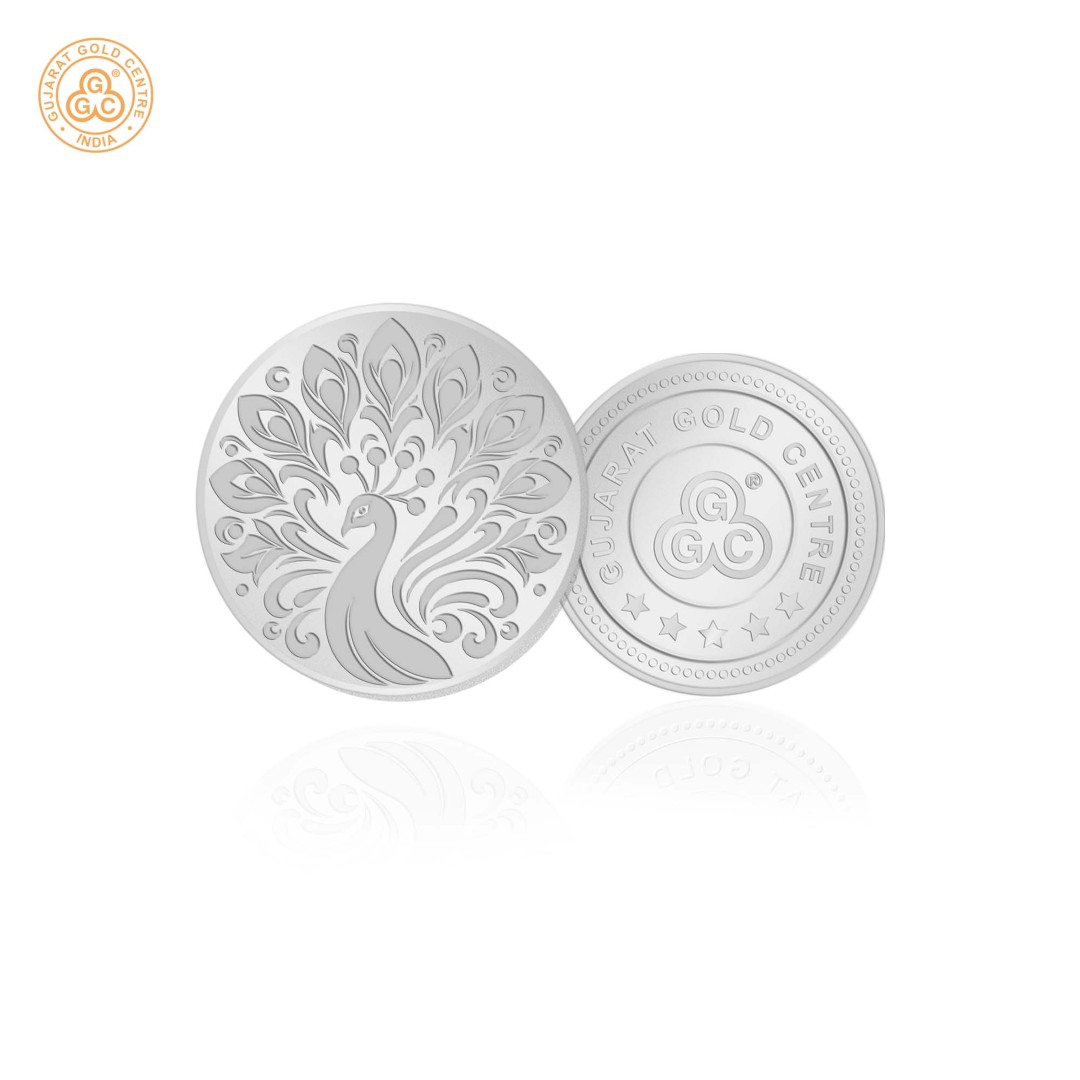 10gm 999 silver coin with elegant embossed peacock design on front  and GGC logo with hallmark on back, glossy and detailed finish.