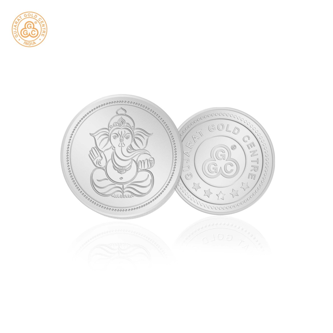 10gm 999 silver coin with detailed embossed Lord Ganesha sitting pose on front,  polished finish, GGC logo and hallmark on back.