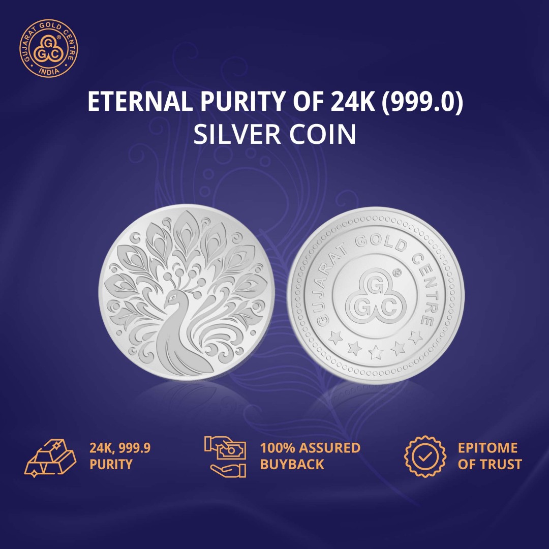 10gm 999 silver coin with elegant embossed peacock design on front  and GGC logo with hallmark on back, glossy and detailed finish.