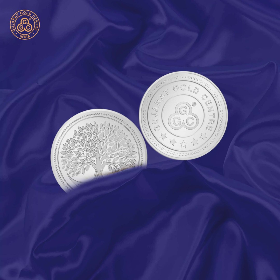 10gm 999 silver coin with embossed Kalpavriksha tree on front and  GGC logo with hallmark on back, polished and detailed finish.